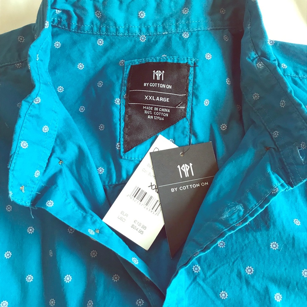 Cotton On short sleeved button down shirt.